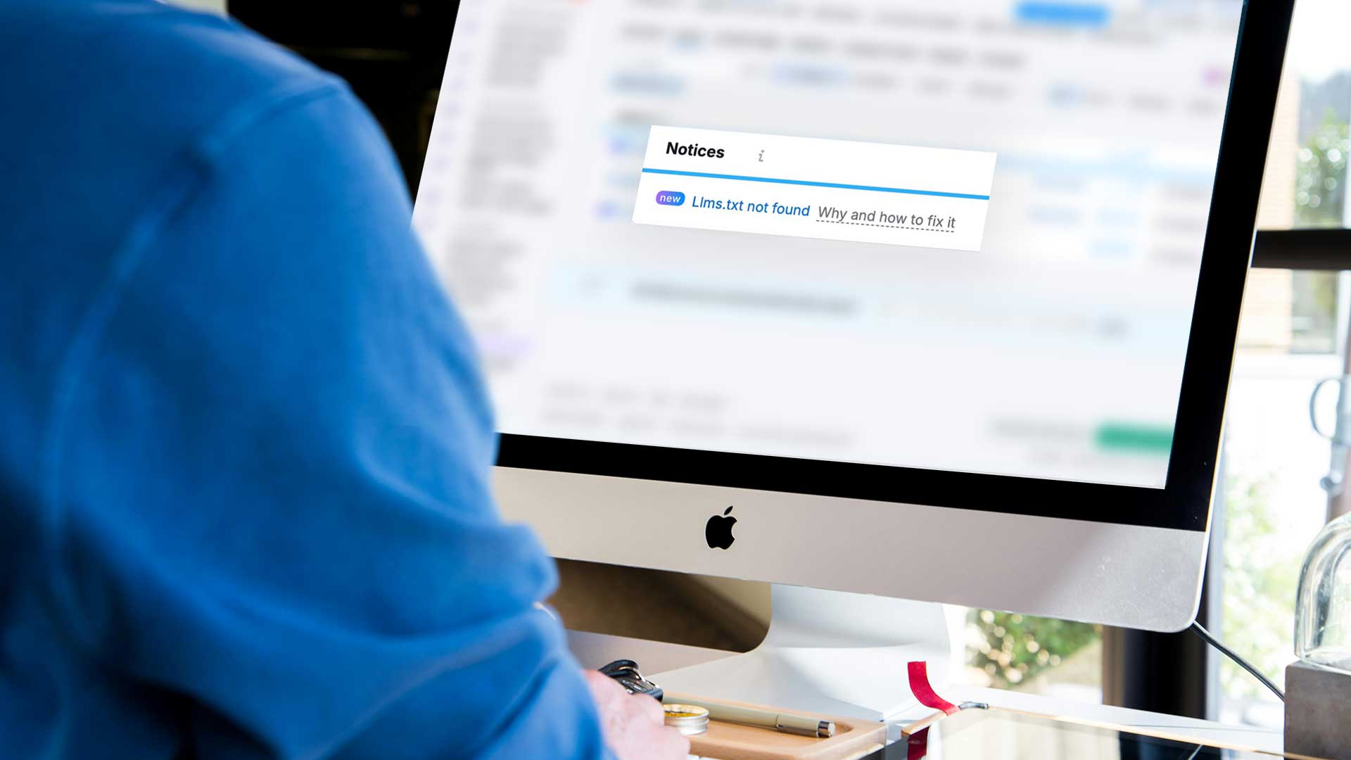 Screenshot of a computer showing a SEMrush notice that says “llms.txt not found — why and how to fix it,” illustrating how SEO tools now check for llms.txt files.